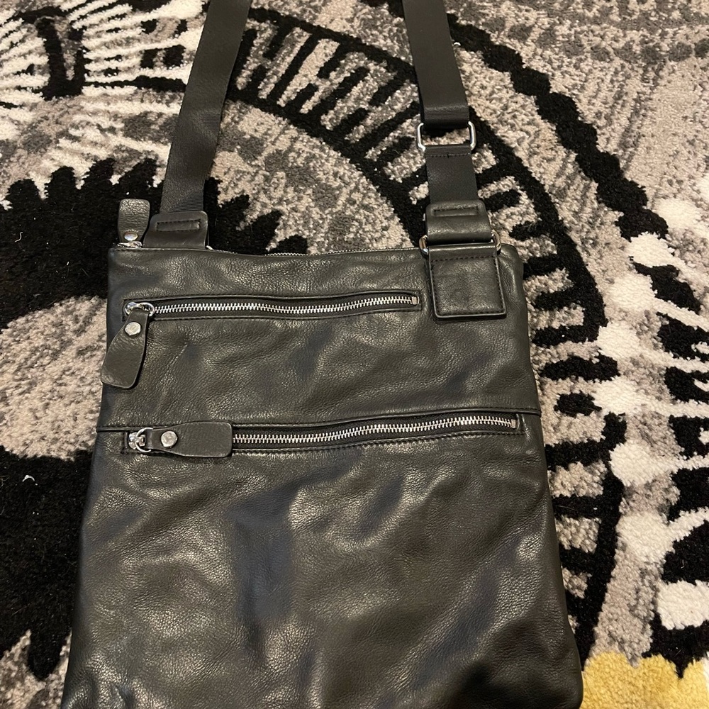 Black travel leather bag